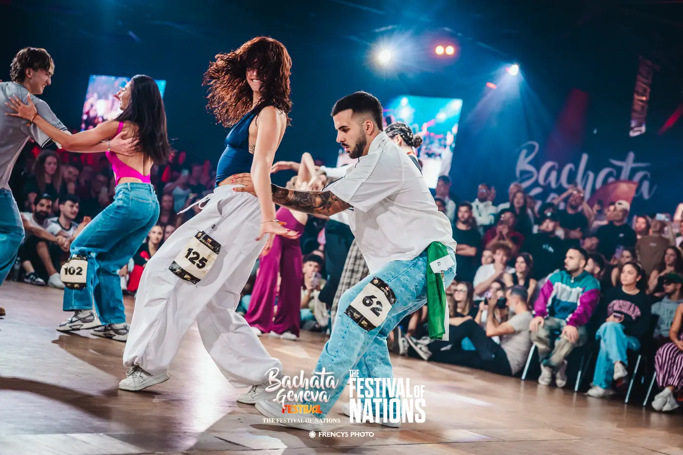 Couples with bibs dancing a heat of the World Cup Finals